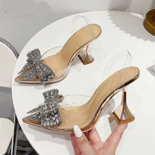 Clear Pointed-Toe Mules with Crystal Bow